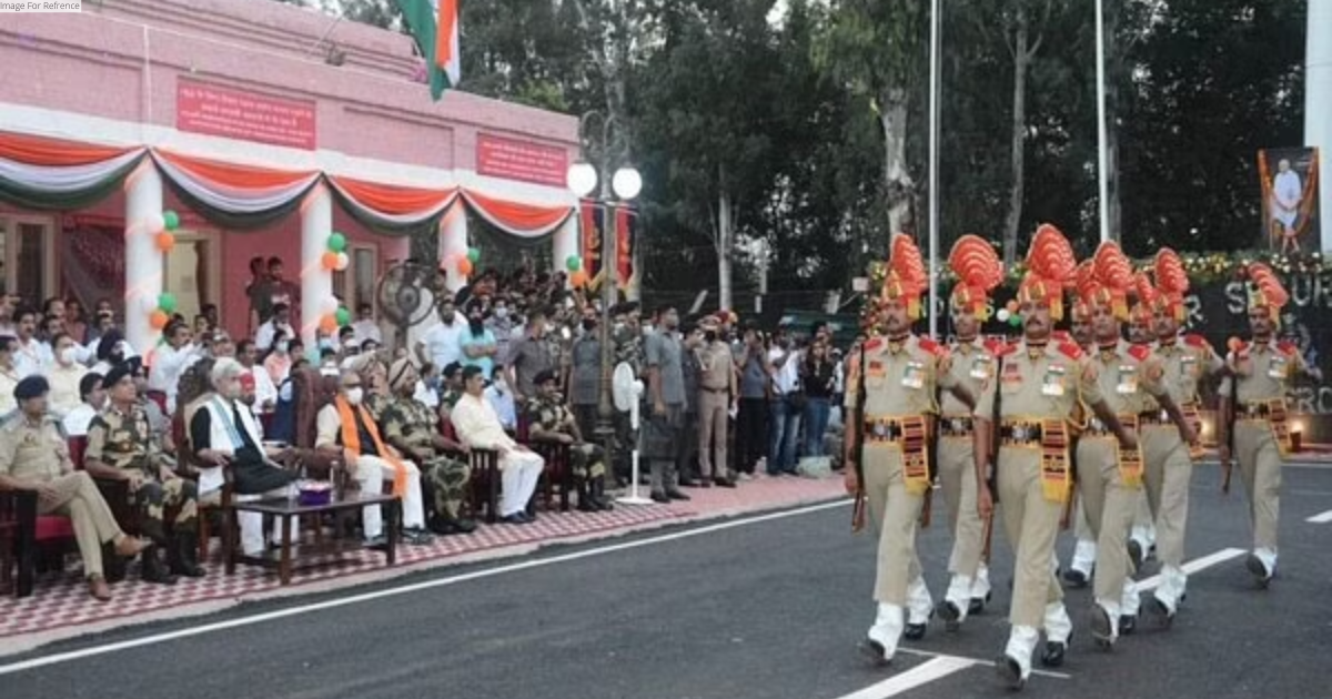 J-K: Traditional parade held at Suchetgarh in Wagah style